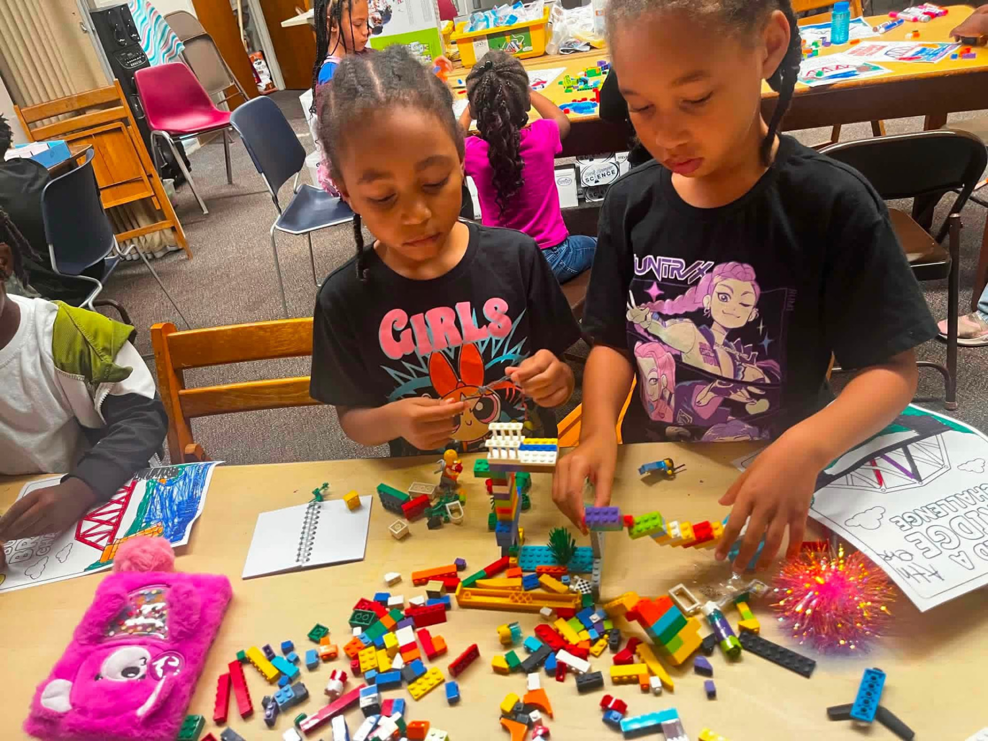 Girls working on a STEM building activity